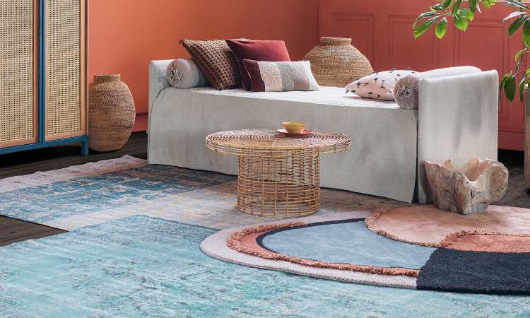Layered rugs in living room