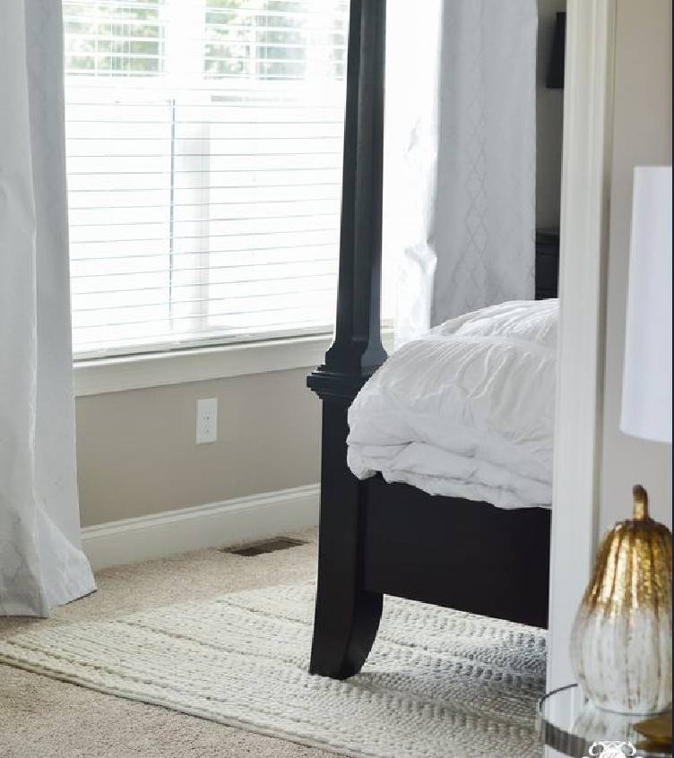 Rug over carpet bedroom