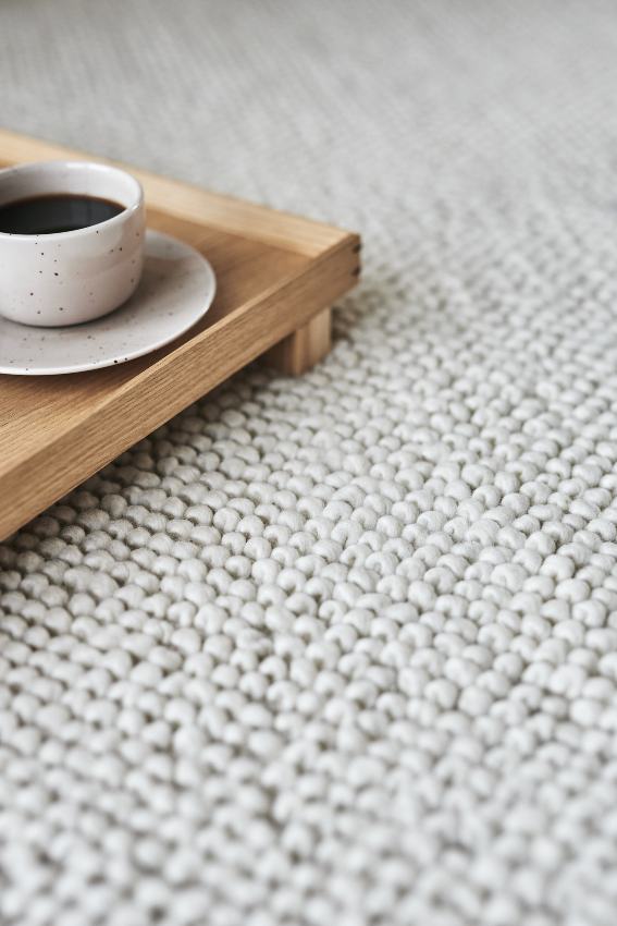 Synthetic vs. wool rug